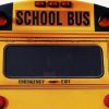 Front of yellow school bus, close-up, part of