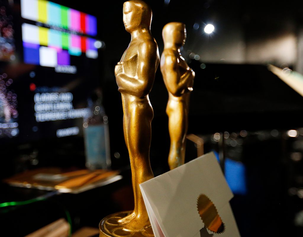 LOS ANGELES, CA - FEBRUARY 18, 2015: Two wooden stand-in Oscar statuettes are ready to be taken on