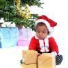 Baby Santa Looking at his Presents
