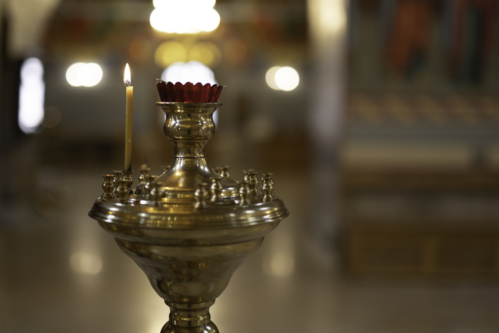 Golden candle holder in the church