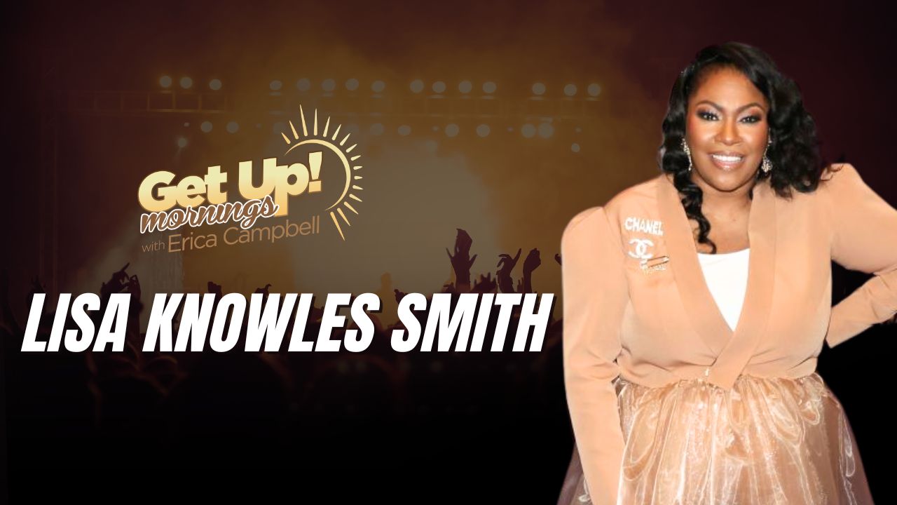 A smiling woman wearing a peach-colored jacket and a Chanel logo stands in front of a "Get Up! Mornings with Erica Campbell" backdrop.